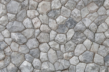 The wall background is made of natural granite.