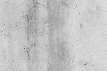 Obraz premium Texture of a concrete wall with cracks and scratches which can be used as a background