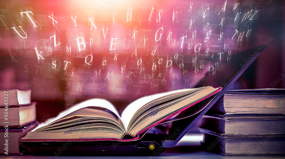 Poster imagine opening an old book blurred with magic power on the table and the english alphabet floating 