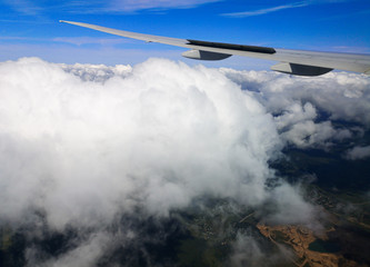 Fototapeta na wymiar Airplane wing in flight