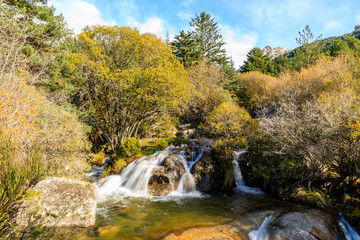 River in La Pedriza, in the mountains of Madrid, area characterized by large granite rocks