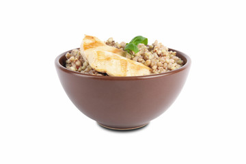 Tasty buckwheat porridge with meat isolated on white