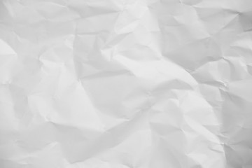 White crumpled paper texture background.