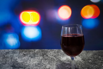 Red wine in a glass, beautiful bokeh background
