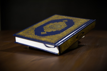 Holy Book of Muslims Islamic Holy Book Quran Majid Closeup Shot with black background