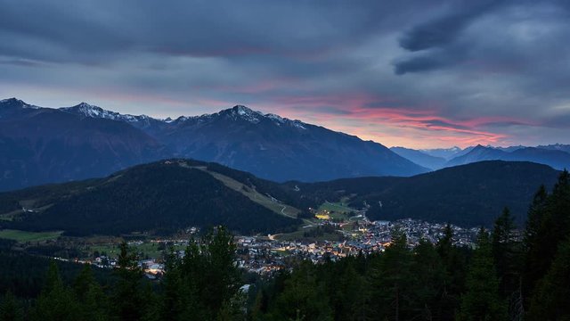Late sunset timelapse over the town of Seefeld in Tirol and the mountains of the Alps, Austria
