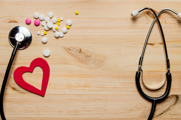 Health insurance form with red heart, stethoscope and pills composition. Health care and medical...