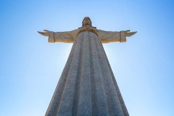 Low angle view of the Sanctuary of Christ the King (Santuario de Cristo Rei). It is a Catholic monument of Jesus Christ in Almada, Portugal.