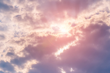 Obraz premium blue clouds on the sky in the rays of the sun in the fall. Landscape background texture, copy space