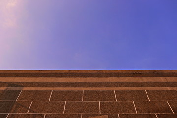 brick blocks building under beautiful blue sky