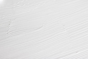 Cosmetics abstract texture background, white acrylic paint brush stroke, textured cream product as make-up backdrop for luxury beauty brand, holiday banner design