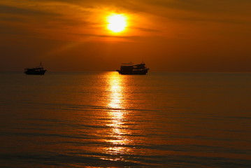 Fototapeta na wymiar summer. Beautiful natural background of sunset with boat on vacation