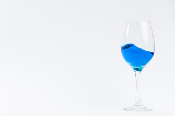glass whith blue water