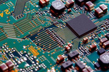 Electronic circuit board close up.