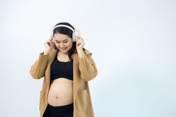 Pregnant women stand away from the white background