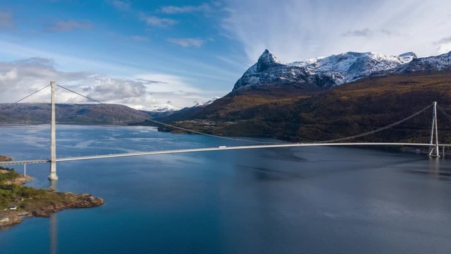 Aerial hyperlapse of the Halogalandsbrua -  a  suspension bridge that crosses the Rombaksfjorden in Narvik Municipality in Nordland county, Norway. It is the second-longest bridge span in Norway.