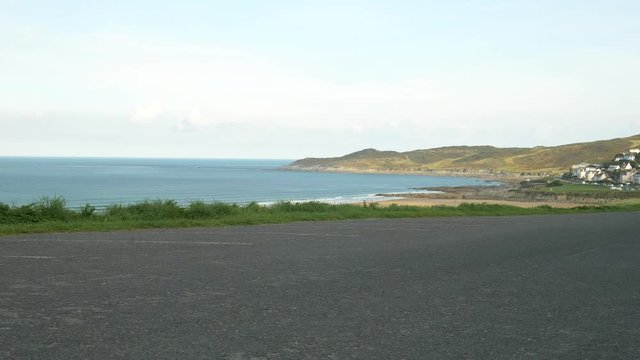 A Beautiful Shot of the Croyde Bay in North Devon with Calm Waters on a Bright Sunny Day