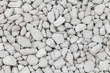 Dusty white industrial gravel texture
