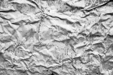 Crumpled gray metal surface, background