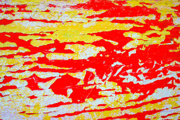 Old painted wall with red and yellow paint
