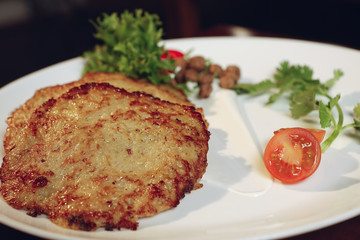Grilled chicken breast. Grilled chicken fillet and salad of fresh vegetables from tomatoes, cucumbers and arugula leaves. Chicken meat salad. Healthy food. The apartment was lying. View from above.