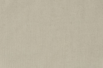 Fototapeta na wymiar Background of white knitted wool close-up