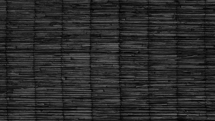 Dark background texture of natural reeds