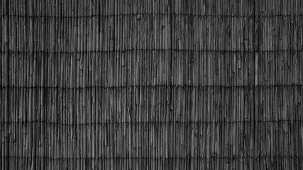 Dark background texture of natural reeds