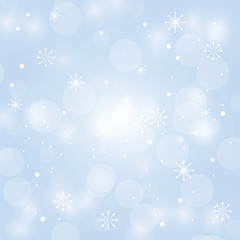 Light blue and white blur abstract background. bokeh with snow for christmas blurred beautiful shiny.