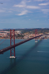 Naklejka premium Ponte 25 de Abril is a suspension bridge connecting the city of Lisbon, to the Almada