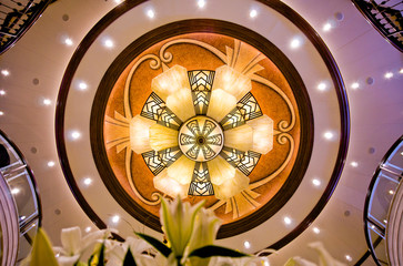 Impressive Artdeco Art Deco main atrium lobby staircase with grand stairs and chandelier on classic...