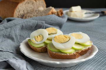 Healthy homemade sandwiches with vegetables and hard-boiled eggs