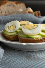Healthy homemade sandwiches with vegetables and hard-boiled eggs