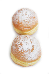 Two Berliner Doughnuts called Krapfen isolated on a white background. European sweet food