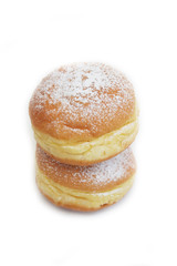 Two Berliner Doughnuts called Krapfen isolated on a white background. European sweet food