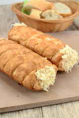 cheese and bechamel puff pastry on a cutting board