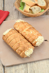 cheese and bechamel puff pastry on a cutting board