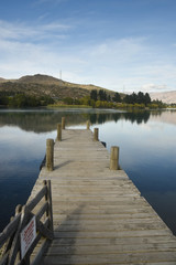 Naklejka premium wooden bridge over the lake