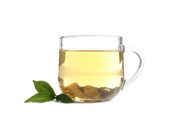 Cup of green tea and leaves isolated on white