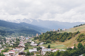 Fototapeta na wymiar Mountain village with towers. Mestia, Svaneti, Georgia
