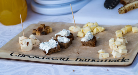 cheese on a wooden plate