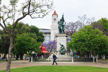 Lisbon, Portugal - May, 29th, 2018 : A man walks past the Marquês de Sá da Bandeira statue at D....