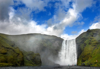 Skogafoss Waterfall in Southern Iceland. The Skogafoss Waterfall is over 60m high and one of the most dramatic waterfalls in Iceland. See this waterfall on tours of the southern coast of Iceland.