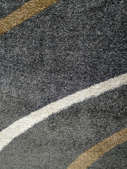 Contemporary geometric design style of artistic rugs, carpets and blankets for interior decoration, made of soft, fluffy and warm wool materials