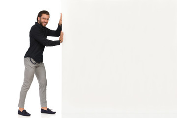 Handsome Smiling Man Is Pushing White Banner