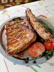 Pork ribs on coals