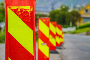 Yellow red road warning signs