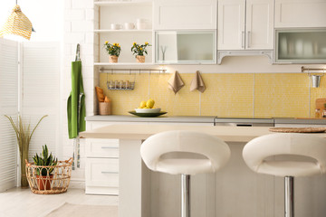 Modern kitchen interior with stylish white furniture