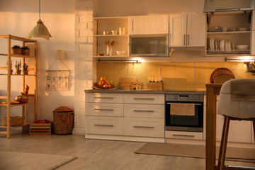 Modern kitchen interior with stylish white furniture