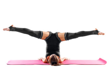Sporty Young Woman Doing Yoga Exercises